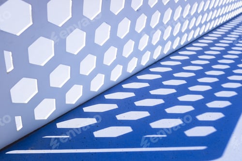 Preview: Geometric shapes of blue tones created by shadows from the sun, minimalist background.