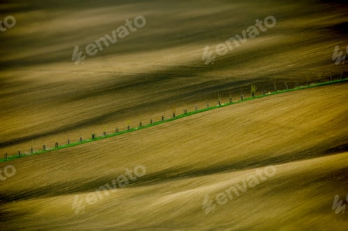 Preview: Aerial abstract photo of the rural areas and a narrow road in Moravia, Czech Republic
