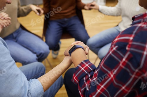Preview: People Holding Hands in Support Group