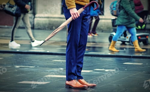 Preview: A man with annumbrella