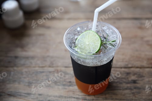 Preview: Ice Tea With Honey And Lemon On Wooden Table