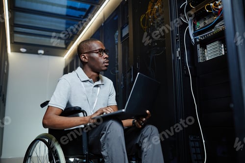 Preview: IT Engineer at Work in Server Room