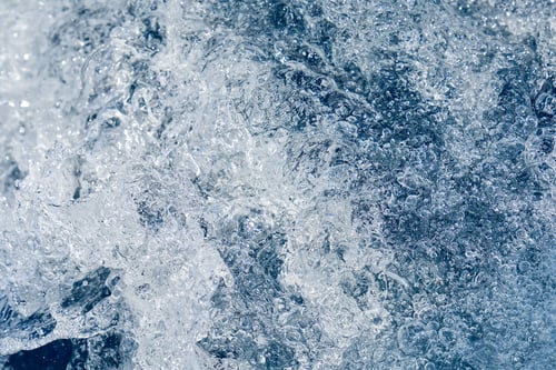 Preview: Abstract blue sea water with white waves. Blue sea texture with waves and foam. Mediterranean sea