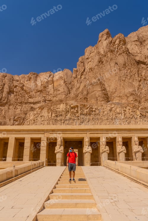 Preview: A young man on the entrance stairs to the Funerary Temple of Hatshepsut in Luxor