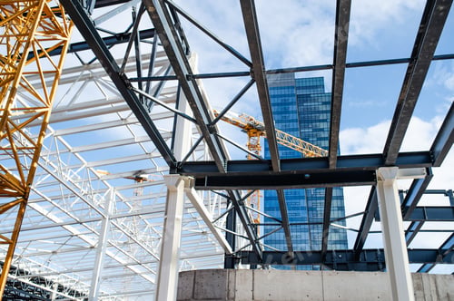 Preview: Construction site with steel frame structure and crane