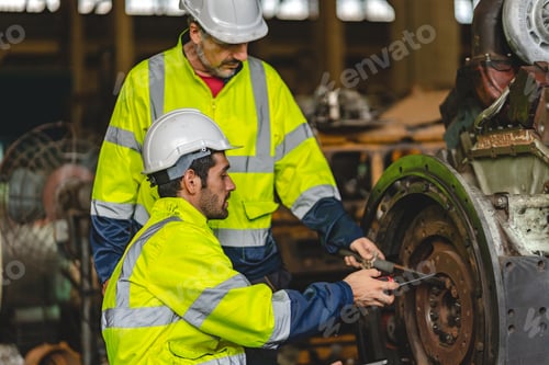 Preview: professional male engineer metal worker industrial experienced operator technician in safety