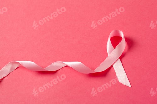 Preview: Pink ribbon and ribbon twist on a bright pink background for awareness campaign event