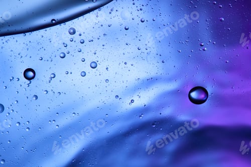 Preview: Beautiful abstract background from mixed water and oil in blue and purple color