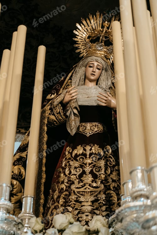 Preview: image of virgin perched on altar among candles