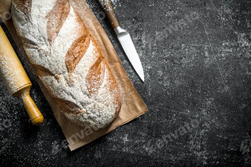 Preview: Rye bread with knife and rolling pin.