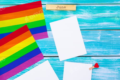 Preview: Gay pride flag on wooden table