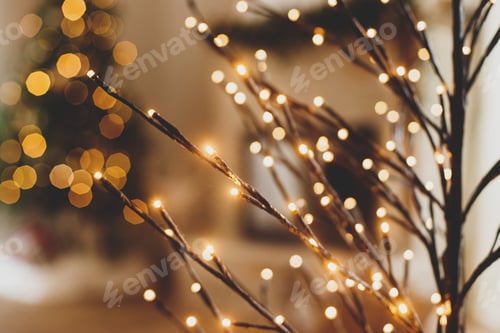 Preview: Modern tree illumination on background of christmas tree lights bokeh