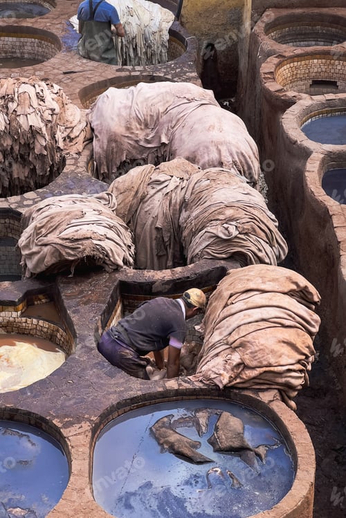 Preview: Men working at Chouara tannery in the old town of Fez