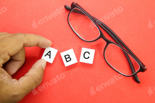 Preview: glasses with letters abc. children's learning concept
