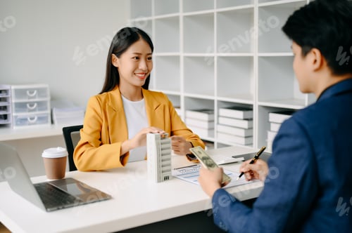 Preview: Asian Real estate broker agent presenting and consult to customer to decision making sign insurance