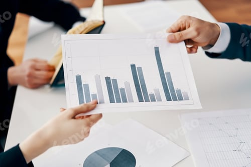 Preview: Business people showing business and financial report with increasing business graph