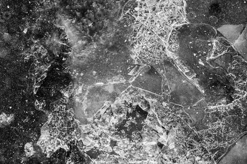 Preview: Black Color Texture Of A Glossy Surface Of Ice With Cracks And With Splinters For Abstract