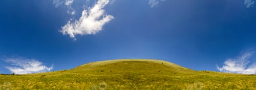 Preview: Panorama of green hills in summer mountains
