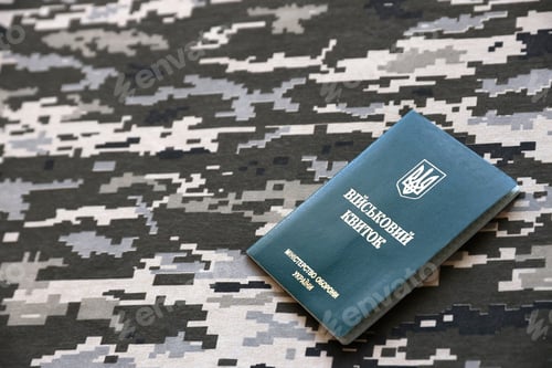 Preview: Ukrainian military ID on fabric with texture of pixeled camouflage