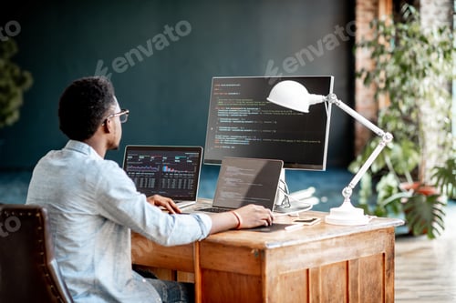 Preview: Programmer working with program code