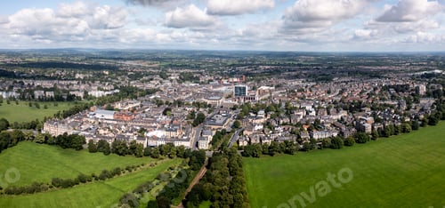 Preview: Aerial townscape view of Harrogate with traffic and The Stray public park