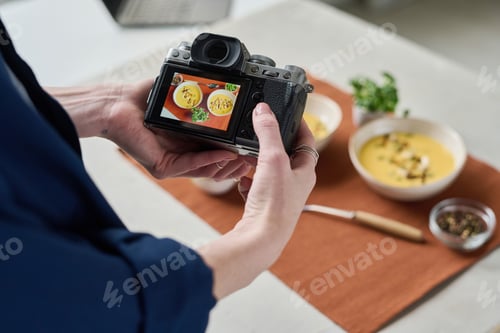 Preview: Woman photographing lunch with camera