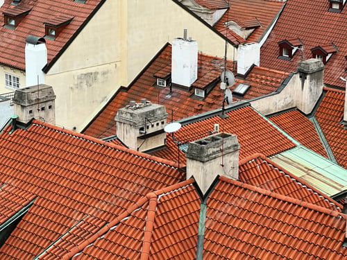 Preview: Abstract Geometric Pattern From Roofs of Old Town With Orange Colored Shingle With White Chimneys