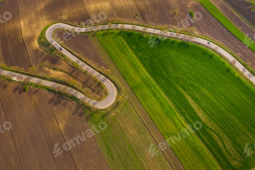 Preview: agricultural hills in spring. Seasonal work concept image.
