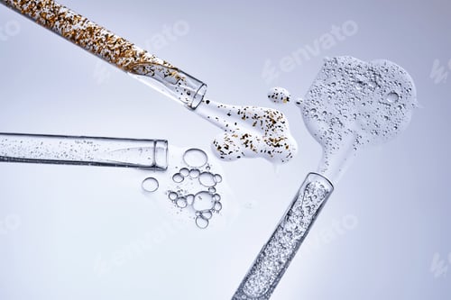 Preview: Three test tubes with spilled serums. Demonstration of textures.