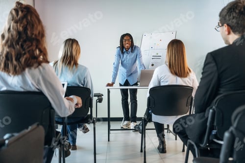 Preview: Discussion of the plan. Group of young business people are in conference room