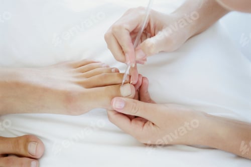 Preview: cropped image of Woman making pedicure