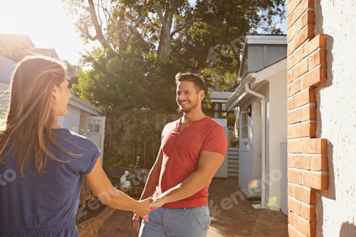 Preview: Loving young couple outdoors in their backyard