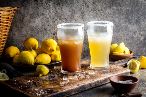 Preview: Two types of latin american beer drink Michelada with lemon juice and salt
