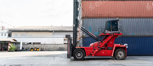Preview: Background of forklift truck at container warehouse preparing to lift cargo boxes