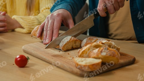 Preview: Caucasian family single dad parent fatherhood breakfast dinner together food father cut bread give