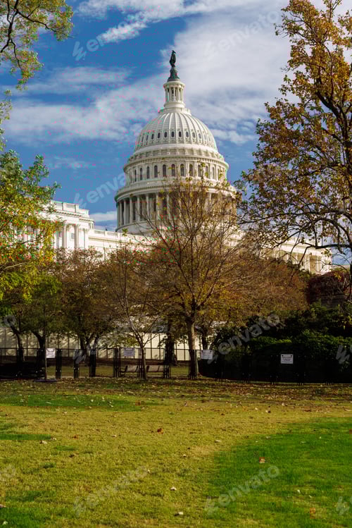 Preview: The U.S. Capitol in Washington, D.C., surrounded by vibrant autumn foliage
