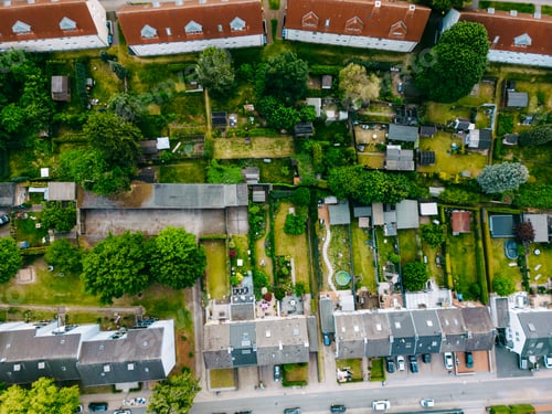 Preview: Scenic landscape from above aerial view of houses in small town in countryside Germany .