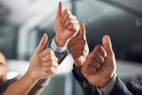 Preview: Thumbs up all round. Closeup shot of a group of businesspeople giving thumbs up together.