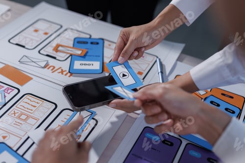Preview: Developers collaborating designing mobile application user experience