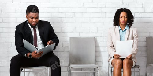 Preview: African American vacancy applicants waiting for job interview in company office