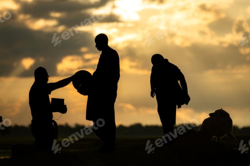 Preview: Monks with alms bowls walk out to take alms food from villagers early in the morning
