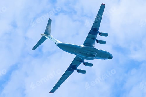 Preview: Airplane is flying in blue sky. Commercial passenger and cargo a