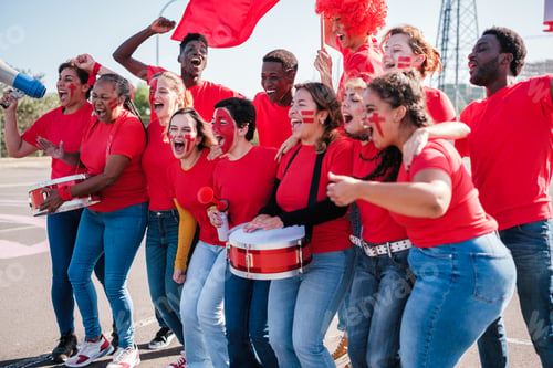 Preview: Group of fans of their team cheering together and with great intensity for theirs