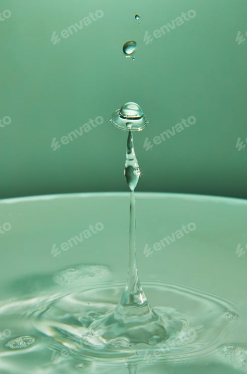 Preview: Abstract background of splash of color water, collision of colored drops, the concept