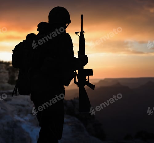 Preview: Silhouette of a military soldier with weapons at sunset