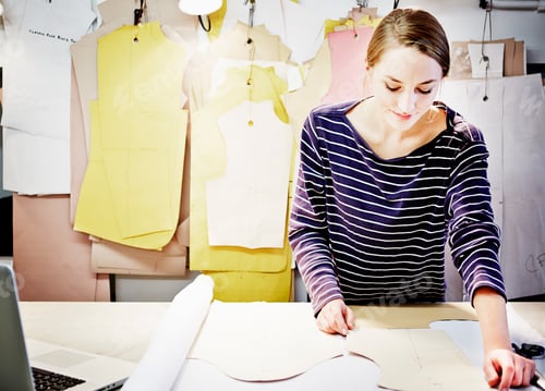 Preview: Seamstress working at table