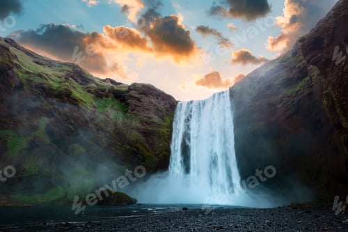 Preview: Famous Skogafoss waterfall on Skoga river in sunrise time