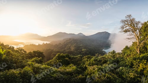Preview: Elevated view of coast and rainforest at sunset, Wana Giri, Bali, Indonesia