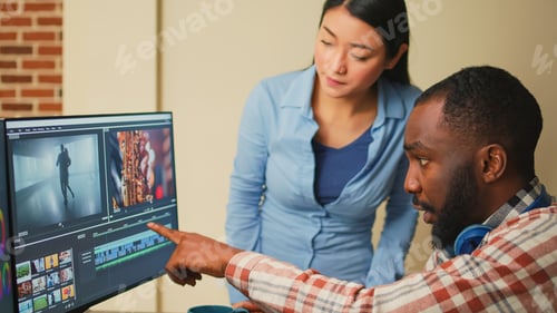 Preview: Creative filmmakers doing teamwork to edit video footage