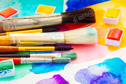 Preview: Watercolor Art Supplies and Colorful Paints on Paper